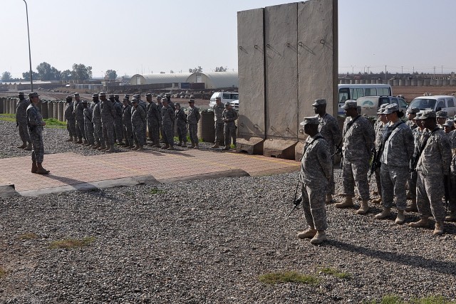 Lt. Col. Paula Lodi, the commander of the Special Troops Battalion, 15th Sustainment Brigade, 13th Sustainment Command (Expeditionary), speaks to Soldiers of the 2nd Battalion, 198th Combined Arms and the STB during a mayor cell transition ceremony h...