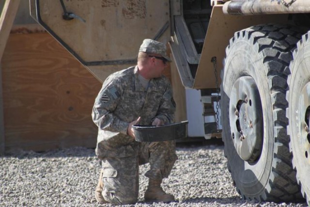 CAMP LIBERTY, Iraq - Spc. Matthew Pearce from Jacksonville, Fla., a heavy vehicle driver with the 396th Transportation Company, 260th Combat Sustainment Support Battalion, 15th Sustainment Brigade, 13th Sustainment Command (Expeditionary) prepares a ...