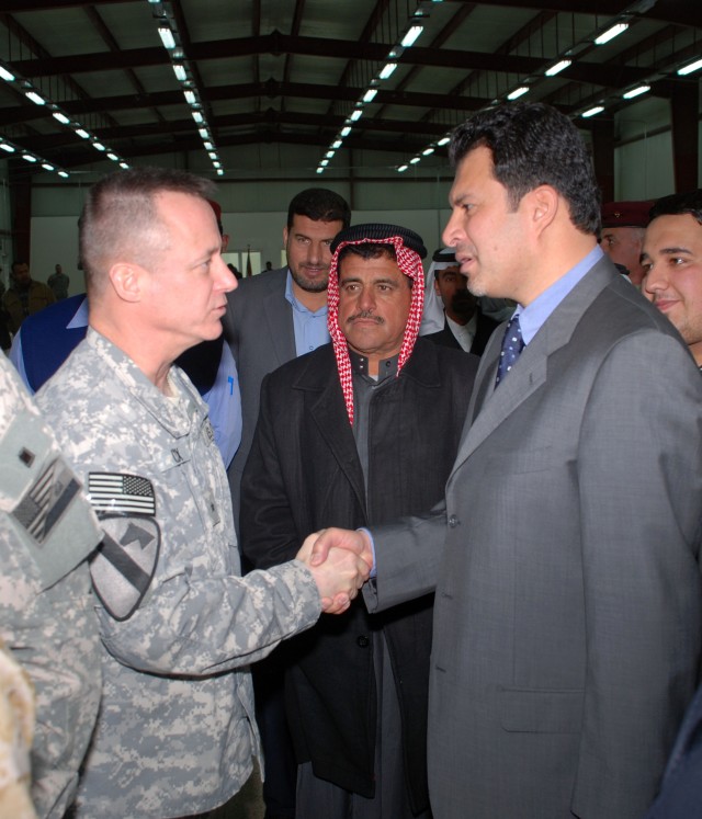 BG Kendall P. Cox Congratulates Iraqi Contracting Firm