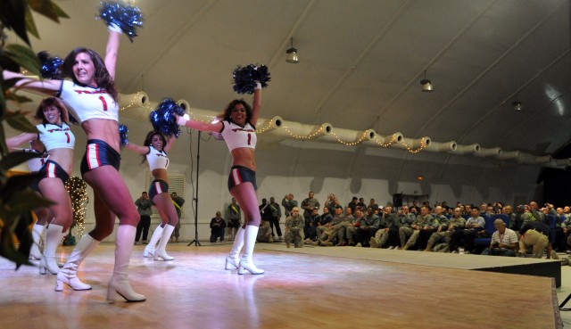 Professional football's Houston Texan cheerleaders perform for service members and civilians at the Morale Welfare and Recreation center here, Feb. 4. The women visited Soldiers of the 15th Special Troops Battalion, 15th Sustainment Brigade, 13th...