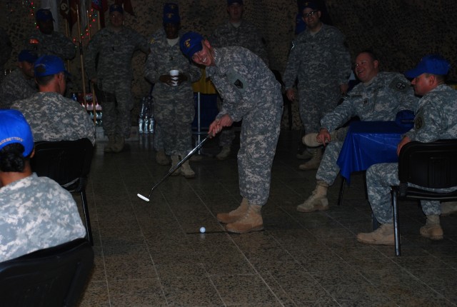 Maj. Steven Dowgielewicz, the 541st CSSB battalion executive officer, 15th Sustainment Brigade, 13th Sustainment Command (Expeditionary) of Amsterdam, N.Y., takes his turn representing Headquarters and Headquarters Company during the putting...