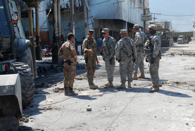 Italians take the lead in rubble removal mission on the streets of Port-au-Prince