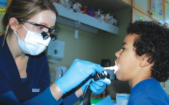 Dental Health: Stuttgart clinic team helps students brush up on oral health know-how