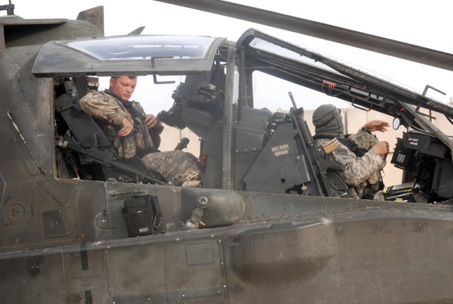 Apaches take less aggressive role in Iraq
