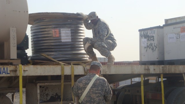 CAMP LIBERTY, IRAQ - Pfc. William Green, a 29-year-old native of Newport News, Va., is a member of the 169th Seaport Operations Company, 260th Combat Sustainment Support Battalion, 15th Sustainment Brigade, 13th Sustainment Command...