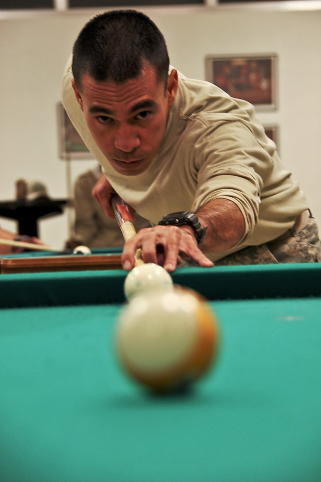 CAMP TAJI, Iraq - With one ball remaining in order to win the match, Staff Sgt. Sasaki Palik, from Kosrae, Micronesia, an infantry squad leader in Company F, 3rd Battalion, 227th Aviation Regiment, 1st Air Cavalry Brigade, 1st Cavalry Division,...