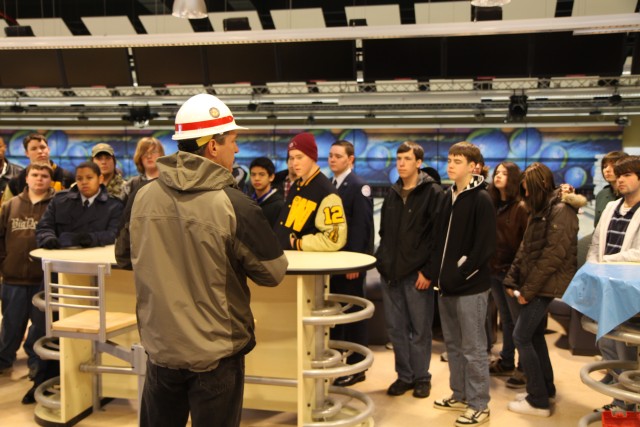 Neil Ravensbergen, a resident engineer with the U.S. Army Corps of Engineers Europe District, explains how engineering design uses mathematics during Engineering Week 2010 activities when more than 40 high school students visited the Wiesbaden...