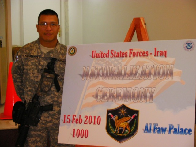 Cpl. Pramote Karngkarn, a mechanic with the 724th Transportation Company, 264th Combat Sustainment Support Battalion, 15th Sustainment Brigade, 13th Sustainment Command (Expeditionary), and Bangkok, native, stands next to the welcome poster at the...