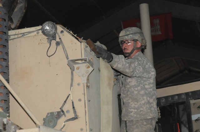 Spc. William L. Hemphill, a Project Phoenix team leader with the 3666th Support Maintenance Company out of Phoenix, Ariz., 541st Combat Sustainment Support Battalion, 15th Sustainment Brigade, 13th Sustainment Command (Expeditionary) and a...