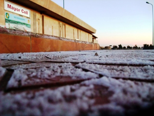 CONTINGENCY OPERATING LOCATION Q-WEST, Iraq - Salt crystals cover the flagstones of the COL Q-West mayor cell, Jan. 15. Evaporated from rainwater, the frost-white crystals indicate a high salt content in the groundwater and soil, said Sgt. Maj....