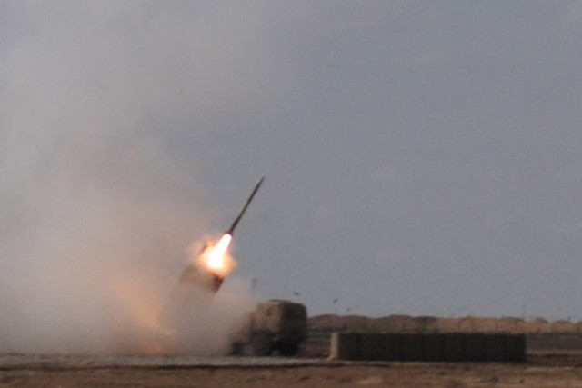CONTINGENCY OPERATING LOCATION Q-WEST, Iraq - A rocket from the C Battery, 1st Battalion, 14th Field Artillery, Task Force Leader, departs its high mobility artillery rocket system launcher here on its way to destroy an enemy mortar position Mar....