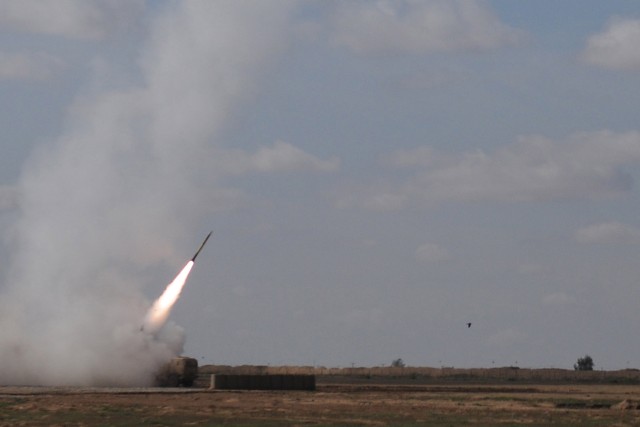 CONTINGENCY OPERATING LOCATION Q-WEST, Iraq - A rocket from the C Battery, 1st Battalion, 14th Field Artillery, Task Force Leader, departs its high mobility artillery rocket system launcher here on its way to destroy an enemy mortar position Mar....