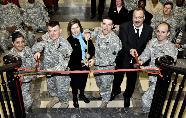 With the snip of a ribbon and the passing of a key, the U.S. Army Corps of Engineers Europe District officially turned over Building 1007 to 5th Signal Command on February 26 at the Wiesbaden Army Airfield. Command Sgt. Maj. Marilyn Washington,...