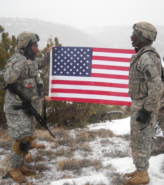 Soldier re-enlists on mountain top during OPT in Wyoming