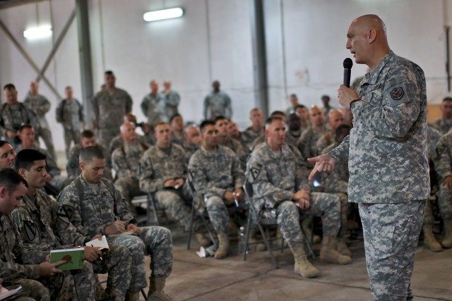 CAMP TAJI, Iraq - First sergeants and company commanders from the 1st Air Cavalry Brigade, 1st Cavalry Division, U.S. Division-Center, listen as Gen. Ray Odierno, commanding general, U.S. Forces-Iraq, speaks to them during a visit to the brigade, Mar...