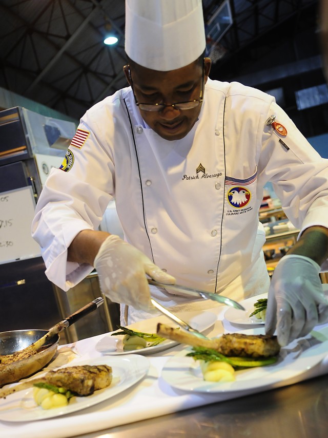 Army Reserve Sgt. Patrick Alveranga competes in the Contemporary Category event at Army Culinary Arts Competition