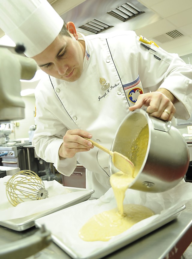 Army Reserve Staff Sgt. Joseph Parker competes in the 35th Army Culinary Arts Competition