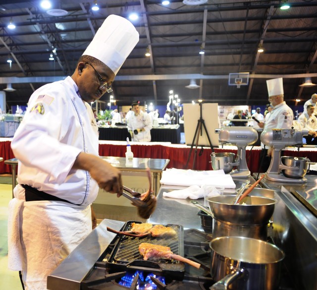 Army Reserve Sgt. Patrick Alveranga competes in the Contemporary Category event at Army Culinary Arts Competition