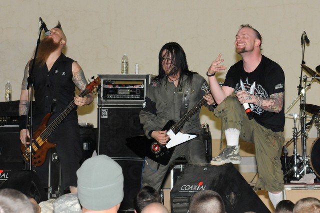 Five Finger Death Punch, a heavy metal band from Los Angeles, performs for service members at Contingency Operating Location Q-West, Iraq, March 5. This tour is the band's first visit to Iraq. (U.S. Army photo by Staff Sgt. Rob Strain, 15th...