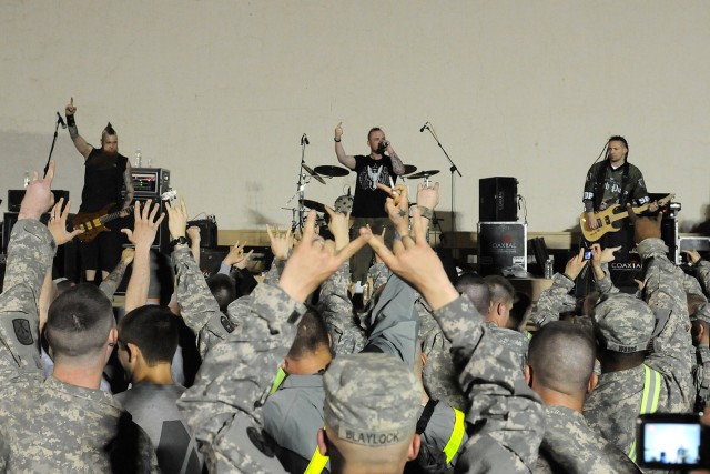 Five Finger Death Punch, a heavy metal band from Los Angeles, performs for service members at Contingency Operating Location Q-West, Iraq, March 5. This tour is the band's first visit to Iraq. (U.S. Army photo by Staff Sgt. Rob Strain, 15th...