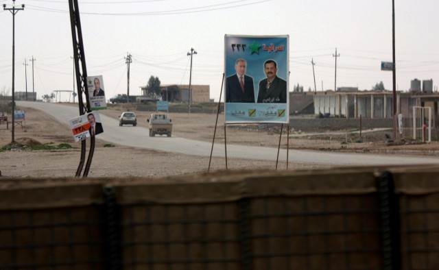 CONTINGENCY OPERATING LOCATION Q-WEST, Iraq - With all the election posters on display in the town of Al-Qayyarah, patrolling Soldiers of C Company, 1st Squadron, 278th Armored Cavalry Regiment of the Tennessee Army National Guard headquartered in He...