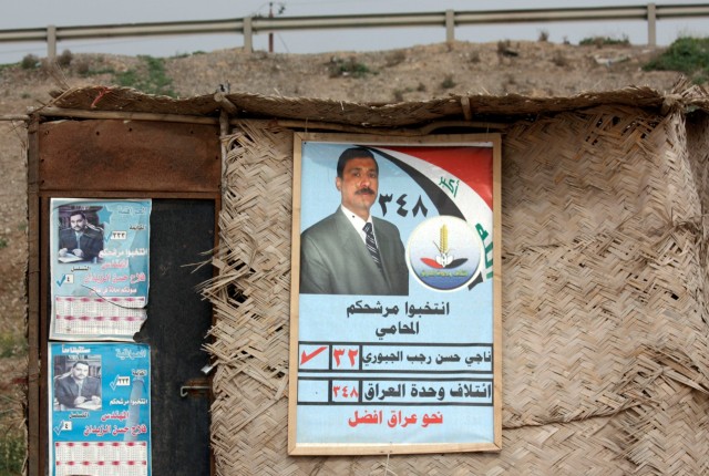 CONTINGENCY OPERATING LOCATION Q-WEST, Iraq - With all the election posters on display in the town of Al-Qayyarah, patrolling Soldiers of C Company, 1st Squadron, 278th Armored Cavalry Regiment of the Tennessee Army National Guard headquartered in He...