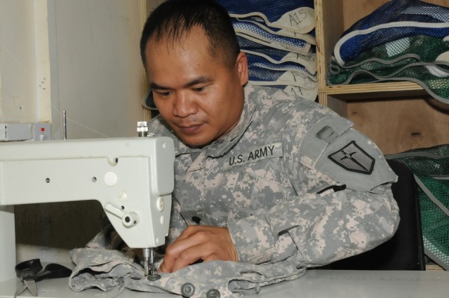 Spc. Anton L. Pakkung, a laundry, showers and textile specialist with the 488th Quartermaster Company out of Fort Polk, La., attached to the 263rd Quartermaster Company, 541st Combat Sustainment Support Battalion, 15th Sustainment Brigade, 13th Susta...