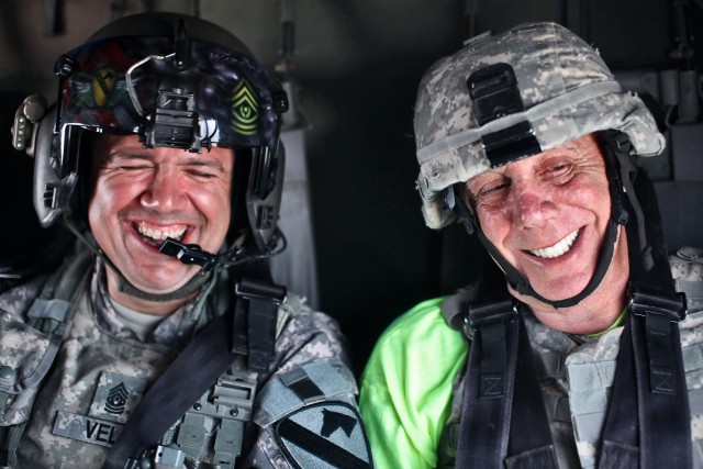 CAMP TAJI, Iraq - Riding in UH-60 Black Hawk helicopter from 3rd Battalion, 227th Aviation Regiment, 1st Air Cavalry Brigade, 1st Cavalry Division, U.S. Division-Center, March 15, Dayton Callie, an actor in the television show "Sons of Anarchy,"...