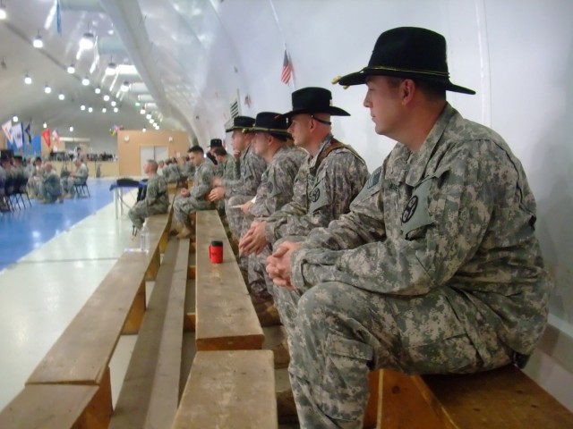 CONTINGENCY OPERATING LOCATION Q-WEST, Iraq -In true Cavalry fashion, wearing spurs and Stetsons, 1st Squadron, 278th Armored Cavalry Regiment Troopers attend the Transfer Of Authority ceremony between incoming 1st Squadron, 278th Armored Cavalry...