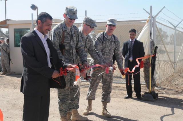 JBB officials cut ribbon at Container Repair Yard