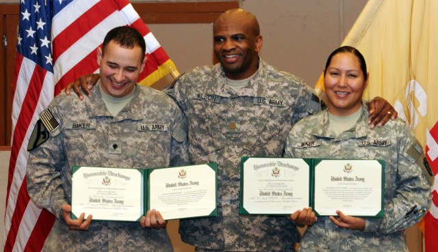 Married-couple Spc. Samuel Baker, a communications system support specialist and  his wife Sgt. Raquel Baker, an automated logistics specialist, both with Headquarters Company, 15th Special Troops Battalion, 15th Sustainment Brigade, 13th...