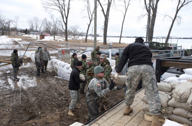 Guardsmen fight floods in three states