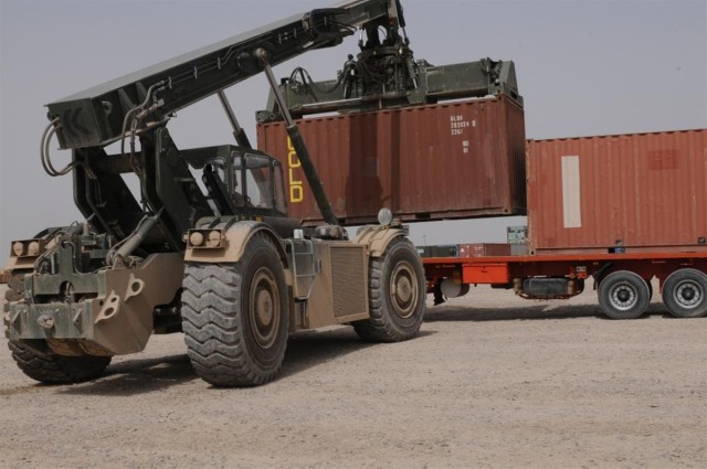 Rough Terrain Container Handler operators manage container yard