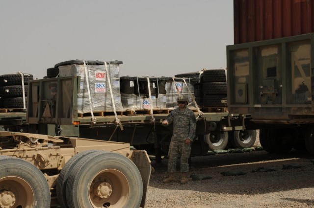 Sgt. Jackie D. Womack, the trailer transfer point noncommissioned officer in charge with the 611th Seaport Operations Company out of Fort Eustis, Va., 541st Combat Sustainment Support Battalion, 15th Sustainment Brigade, 13th Sustainment Command...
