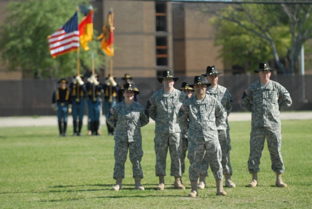 FORT HOOD, Texas-Col. Ryan Gonsalves (front), the outgoing commander of 2nd Brigade Combat Team, 1st Cavalry Division, stands in front of his staff officers and the 1st Cavalry Division Honor Guard during the 2nd BCT change of command ceremony on For...