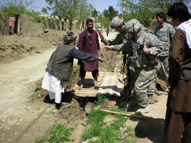 Soldiers Assist Locals in Meymaneh
