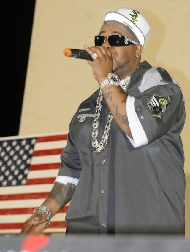 Rap-recording artist and Chicago native Twista performs for service members at a show for the troops in the outdoor theater here April 14 on the second stop of a five-stop tour. (U.S. Army photo by Staff Sgt. Matthew C. Cooley, 15th Sustainment...