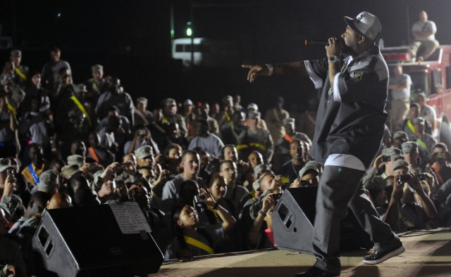 Rap-recording artist and Chicago native Twista performs for service members at a show for the troops in the outdoor theater here April 14 on the second stop of a five-stop tour. (U.S. Army photo by Staff Sgt. Matthew C. Cooley, 15th Sustainment...