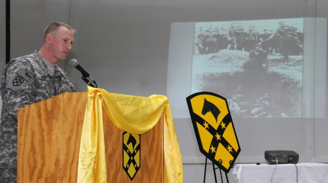 Jewish Sgt. Randy Bare, a Biloxi, Miss., native and squad leader for the 15th Special Troops Battalion, 15th Sustainment Brigade, 13th Sustainment Command (Expeditionary), speaks to Soldiers at a Holocaust Days of remembrance observation at Morale...