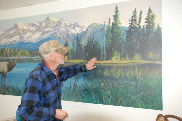 LeeJensen and his mural at Bonneville Lock and Dam