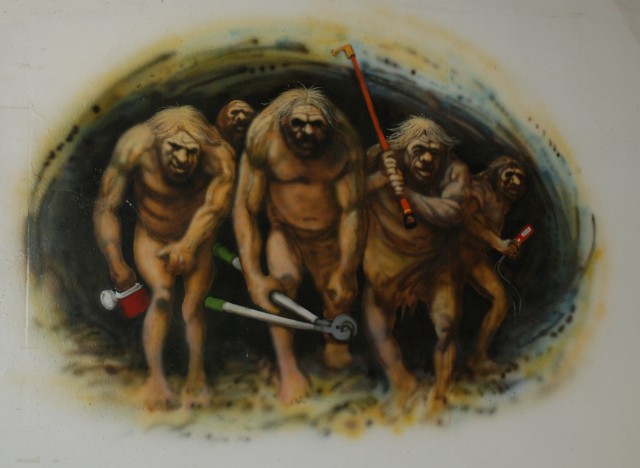 Cavemen with Tools sign