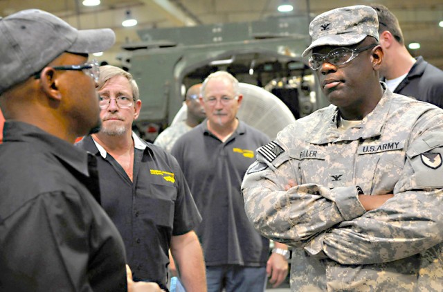 Fuller tours Stryker facility in Qatar