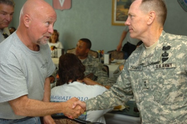 Maj. Gen. Champoux Greets a Vietnam veteran 