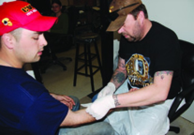 Tattoos no longer taboo - art form tells Soldiers&#039; tales
