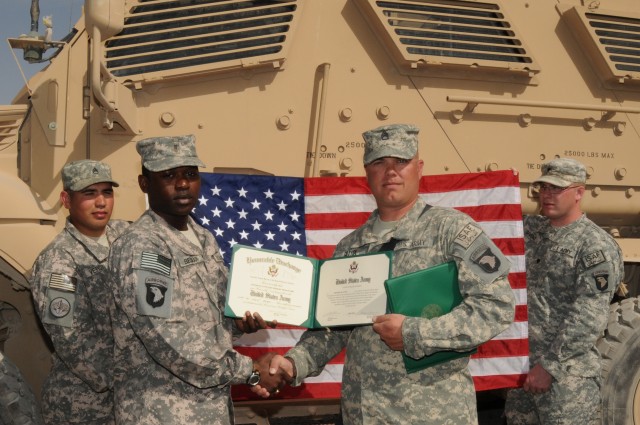 Three Soldiers reenlist with TF Troubleshooter at Kandahar Airfield