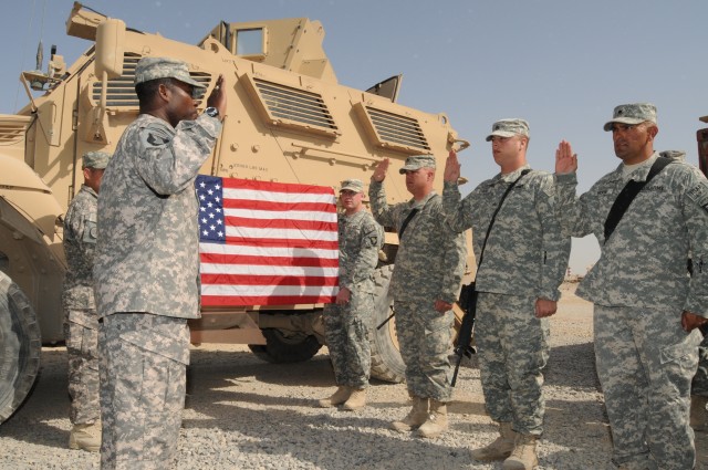 Three Soldiers reenlist with TF Troubleshooter at Kandahar Airfield