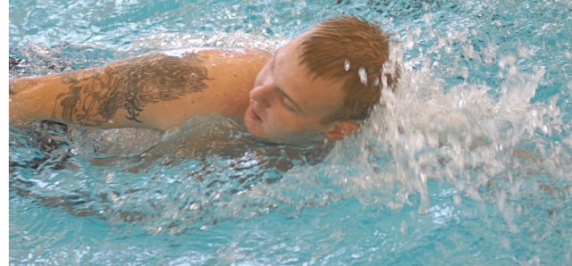 SPC Chris Strickland of the Warrior Transition Battalion at Fort Benning swims Tuesday at Smith Fitness Center to prepare for the inaugural Warrior Games, which will be May 10-14 at the Olympic Training Center in Colorado Springs, Colo. He will...