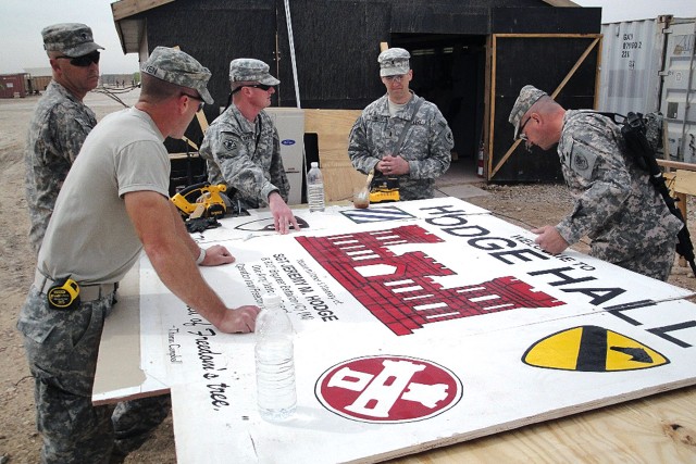 Prepping 'Hodge Hall' sign for transport
