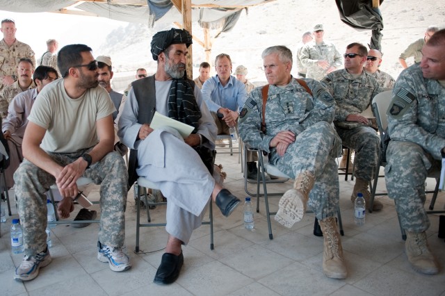 Abdul Jabar, district governor of Arghandab, and Gen. George W. Casey Jr., Chief of Staff of the U.S. Army, have a meeting in Kandahar, Afghanistan, April 29, 2010. The two leaders discussed the increasing working relationships between the local...