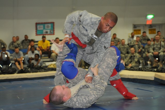 Spc. Billy C. Avery, a supply specialist with the 63rd Ordnance Company out of Fort Lewis, Wash., 80th Ordnance Battalion, 15th Sustainment Brigade, 13th Sustainment Command (Expeditionary) and a Pennington, Texas, native, competes against Air Force ...